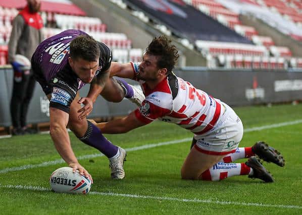 Tom Briscoe scores in Rhinos' win at Leigh two weeks ago. Picture by Paul Currie/SWpix.com.