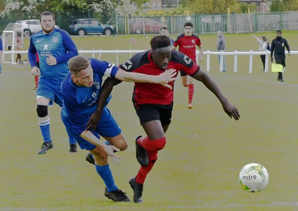 Gibril Bojang, right, was among the scorers in Horbury Town's 4-0 West Yorkshire League Premier Division win over Boroughbridge First. Picture: Steve Riding.
