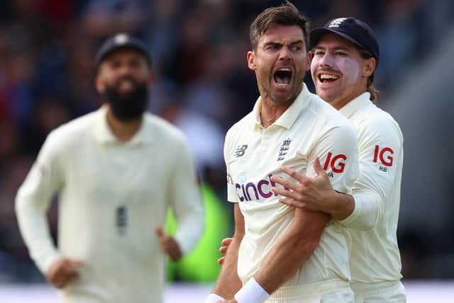England's James Anderson celebrates with Rory Burns after taking the wicket of Virat Kohli of India at Emerald Headingley. (Photo by Michael Steele/Getty Images)