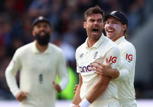 England's James Anderson celebrates with Rory Burns after taking the wicket of Virat Kohli of India at Emerald Headingley. (Photo by Michael Steele/Getty Images)