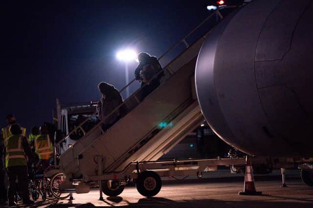 British nationals and Afghan evacuees depart a flight from Afghanistan at RAF Brize Norton (Photo: Jacob King/PA Wire)