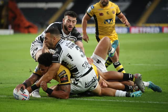 AT THE DOUBLE: Castleford Tigers’ Jordan Turner in at the double to put the visitors in front against Hull FC last night. Picture by John Clifton/SWpix.com
