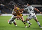 LEADING MAN: Castleford Tigers' Danny Richardson comes up against Hull FC's Danny Houghton and Andre Savelio. Picture by John Clifton/SWpix.com.
