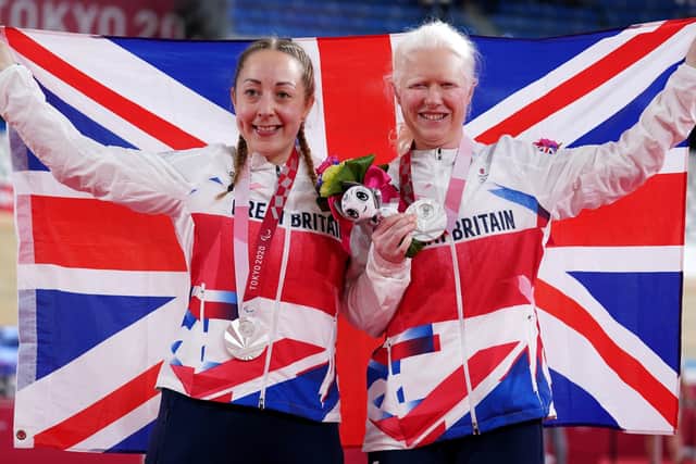GB's Aileen McGlynn and pilot Helen Scott pose with their silver medals for the Women's B 1000m Time Trial at the Izu Velodrome. Picture: Tim Goode/PA