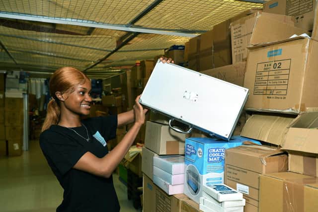 Pictured Ife Ogunade picking an order. Photo: Jonathan Gawthorpe