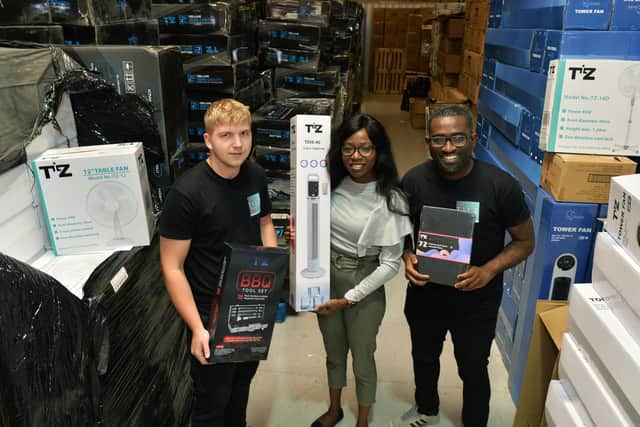 Pictured with husband Ola, right, and team member Karl Thackrah. Photo:Jonathan Gawthorpe