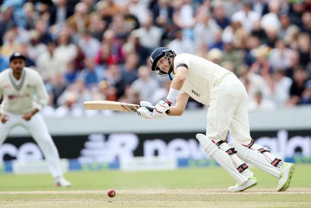 England's Joe Root turns one through mid-wicket as the hosts pile on the runs against India in the third Test at Headingley. Picture: Nigel French/PA.