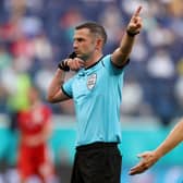 Michael Oliver in action at Euro 2020.