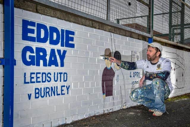 Andy McVeigh with his Leeds United mural of Eddie Gray's iconic goal against Burnley