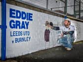 Andy McVeigh with his Leeds United mural of Eddie Gray's iconic goal against Burnley
