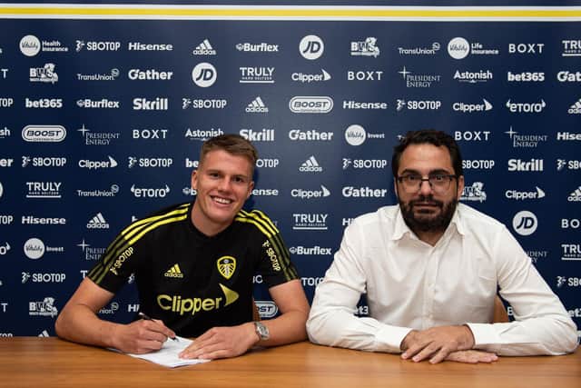 NEW FACE - Leo Hjelde with Leeds United director of football Victor Orta.