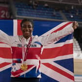 Kadeena Cox celebrates winning Gold in the Women's C4-5 500m Time Trial at Izu Velodrome during day three of the Tokyo 2020 Paralympic Games in Japan