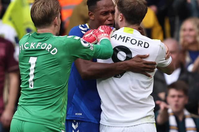 TUSSLE: Leeds United striker Patrick Bamford, right, and Everton's Yerry Mina, centre, were involved in an epic battle in last weekend's 2-2 draw at Elland Road. Photo by Marc Atkins/Getty Images.