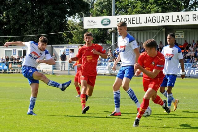 Guiseley's George Cantrill fires in a shot against Gloucester City. Picture: Steve Riding.