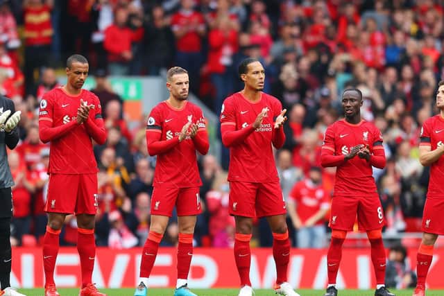Liverpool players remember Hillsborough victim Andrew Devine at Anfield.