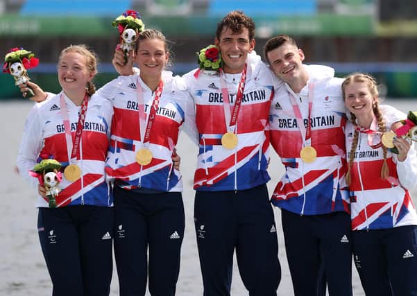 Leeds’ Ellen Buttrick (far left) celebrates with team-mates Giedre Rakauskaite, James Fox, Oliver Stanhope and cox Erin Kennedy after winning gold in the PR3 mixed coxed four. Picture: Naomi Baker/Getty Images.
