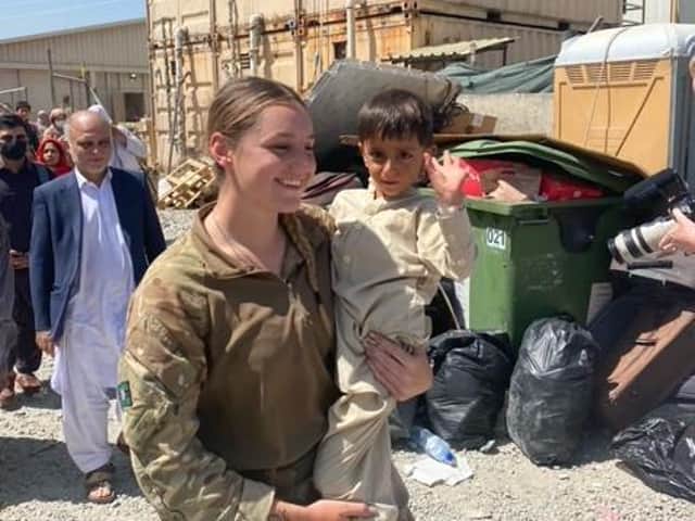 A Yorkshire Regiment soldier meets an Afghan child
