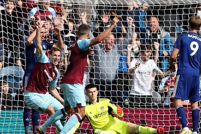 PEGGED BACK: Former Whites striker Chris Wood, left, had Burnley on course for victory after netting in the 61st minute, above, but Leeds United fought back to claim a point in Sunday's clash at Turf Moor. Photo by Jan Kruger/Getty Images.