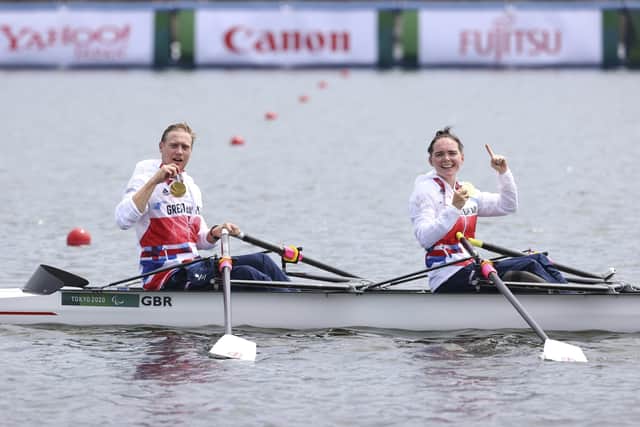 GOLDEN PAIR: GB rowers, Lauren Rowles, right, and Laurence Whiteley from Northallerton, celebrate winning gold in the PR2 Mixed Double Sculls - in Tokyo Picture: imagecomms/ParalympicsGB/PA