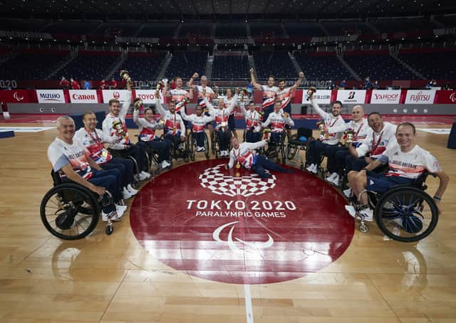 GB's Wheelchair Rugby Mixed team - including Rotherham's Gavin Walker, Normanton's Jamie Stead and Stockton on Tess' Jack Smith - celebrate winning gold after defeating USA in Tokyo Picture: imagecomms/ParalympicsGB/PA