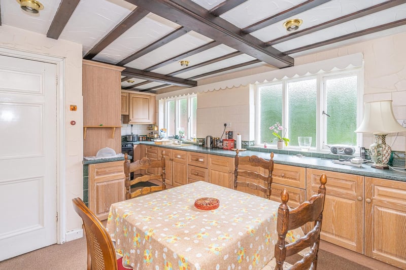 The spacious fitted kitchen within the property.