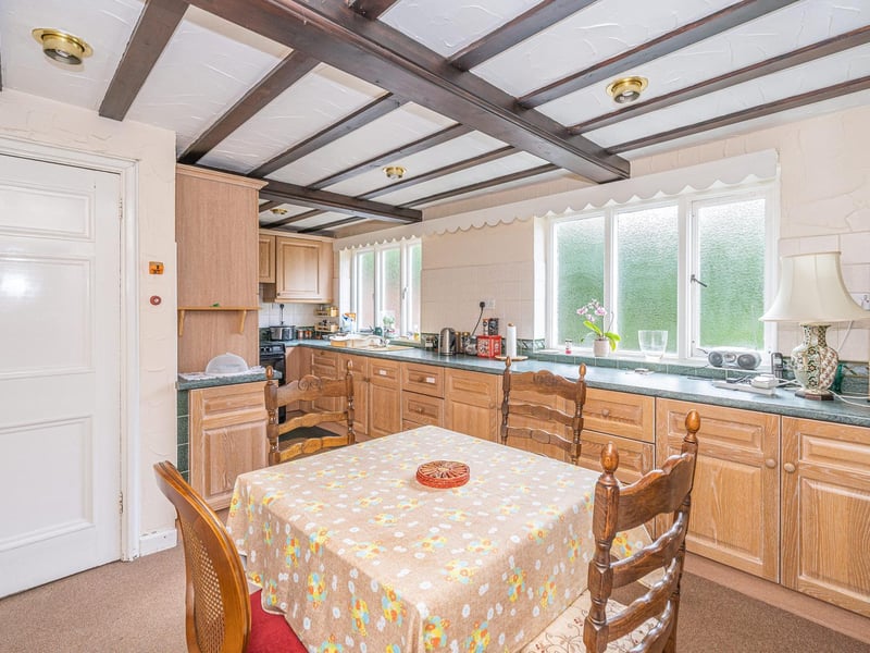 The spacious fitted kitchen within the property.