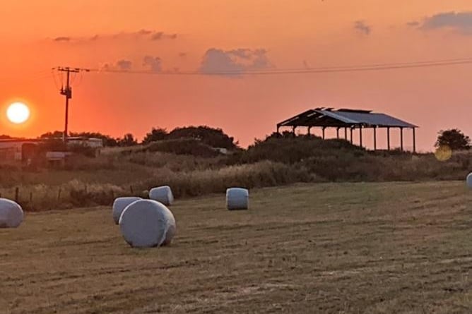 Steve Turner's photo of a sunset on the farm.