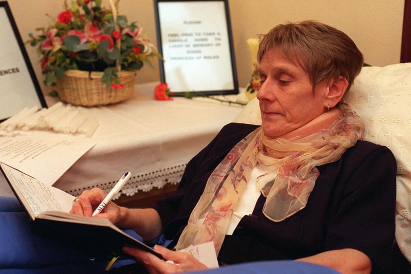 Pam Russell writes in the Diana, Princess of Wales book of condolence at St Gemma's Hospice.