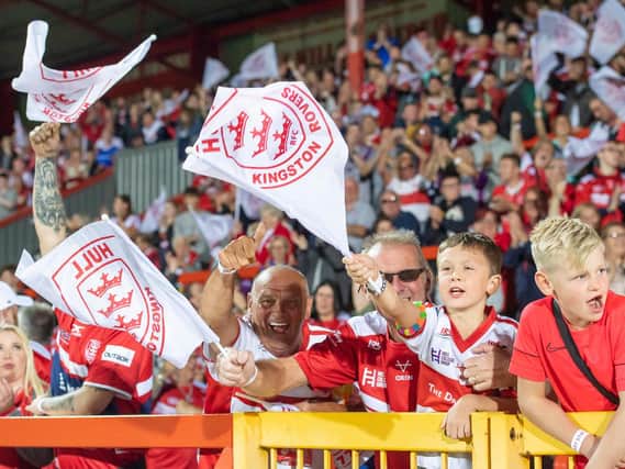 Hull KR fans celebrate their win over Wigan at Hull College Craven Park. (ALLAN MCKENZIE/SWPIX)