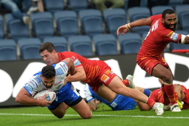 Rhyse Martin scores against Catalans Dragons. Picture by Jonathan Gawthorpe.