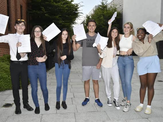 Pupils at The Farnley Academy collecting their GCSE results last month. Picture: Steve Riding