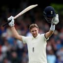 LEADING MAN: England captain Joe Root celebrates reaching 100 on day two of the Third Test match against India at Headingley Picture: Nigel French/PA