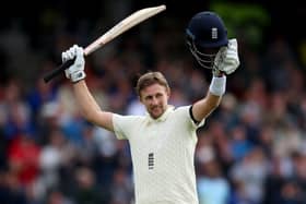LEADING MAN: England captain Joe Root celebrates reaching 100 on day two of the Third Test match against India at Headingley Picture: Nigel French/PA