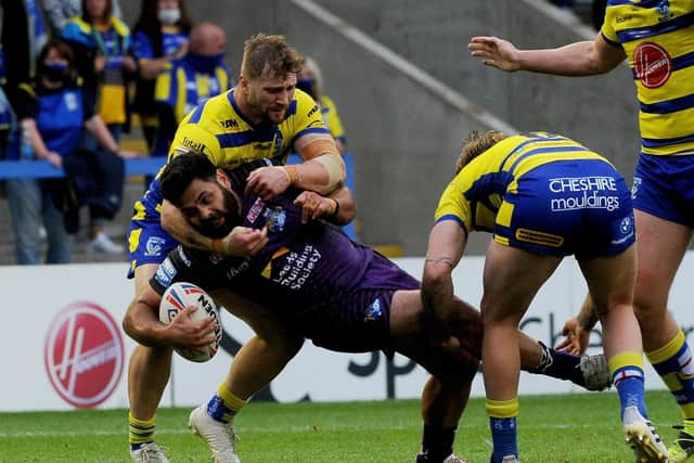 Rhyse Martin in actrion for Rhinos against Warrington. Picture by Simon Hulme.