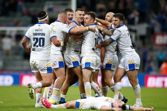 Leeds Rhinos players celebrate after their Dacia Magic Weekend golden point extra time victory over Hull FC. Picture: Ed Sykes/SWpix.com.