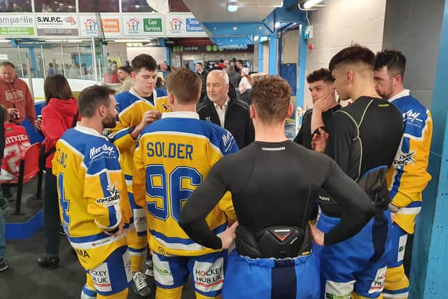 Leeds Knights' head coach Dave Whistle runs through some last-minute preparations with his defencemen.