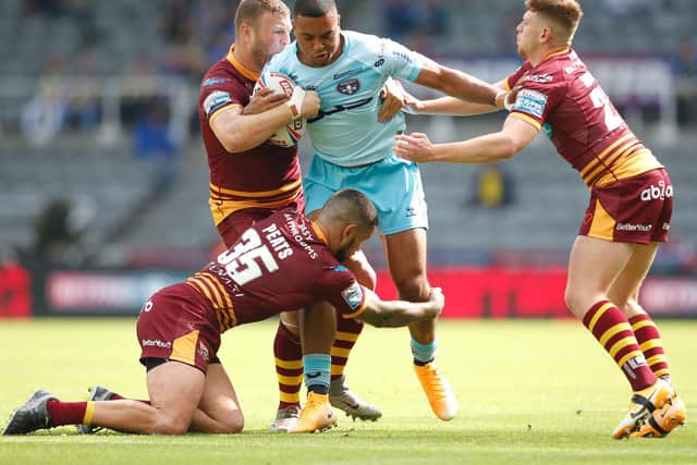 Wakefield Trinit's Ed Sykes takes on Huddersfield Giants. (ED SYKES/SWPIX)