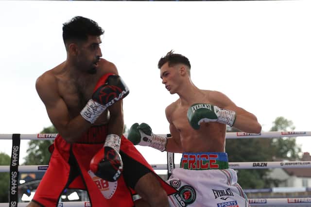 IN-RING ACTION: Hopey Price and Zahid Hussain. Picture: Mark Robinson/ Matchroom Boxing