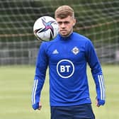 SENIOR SWITCH - Leeds United youngster Alfie McCalmont was moved up from the Under 21s to play for Northern Ireland's senior side during this international break. Pic: Pacemaker.