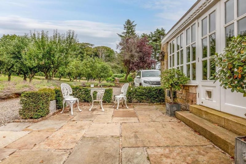 Halton-with-Aughton, Lancaster. The garden room at the property has a patio door leading out to a flagged terrace area. Picture courtesy of Houseclub.