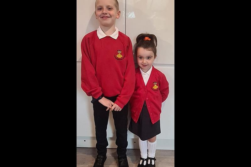 First day of reception for Rhian, aged 4, and year 5 for Lee, aged 9. Picture: Toni-Ann Carter