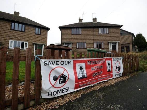 Flying the flag for the Save Our Homes campaign on Wordsworth Drive and Sugar Hill Close.