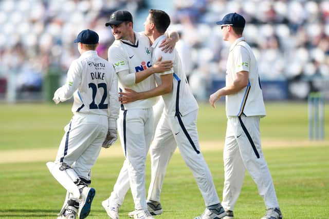 Yorkshire's Matt Fisher celebrates the wicket of Somerset's Azhar Ali with team-mate Jordan Thompson Picture by Will Palmer/SWpix.com