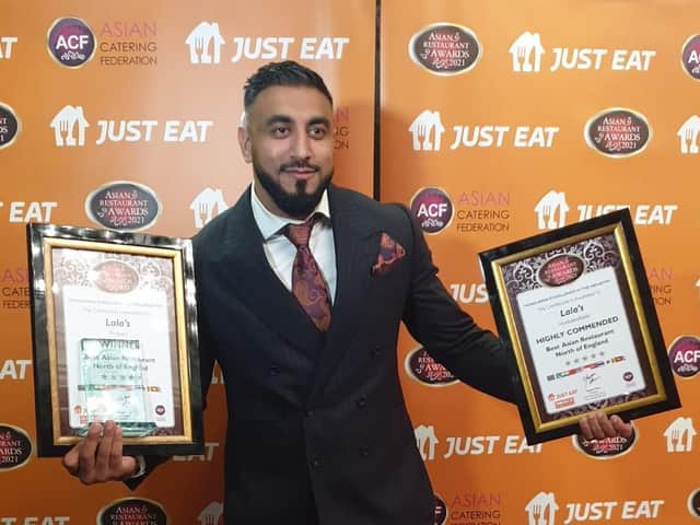 Junior Rashid, collecting the award for best Asian restaurant in the north of England at the Asian Restaurant Awards 2021.