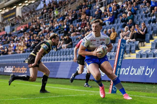 Leeds Rhinos' Jack Broadbent runs in for a try  against Leigh Centurions in July. Picture by Alex Whitehead/SWpix.com