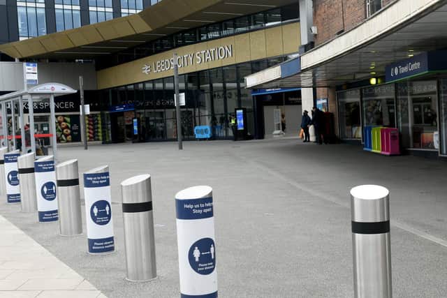 Police officers were attacked while attempting to break up a fight at the taxi rank near Leeds Station.