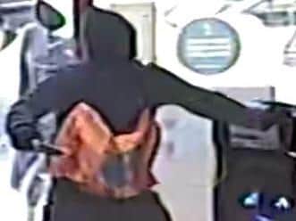 One of the suspects captured on the store's CCTV.