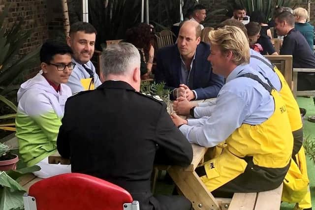 Ravi Saini and crew members Adam Sheader (left), Rudi Barman and Rob Gaunt meet the Duke of Cambridge.