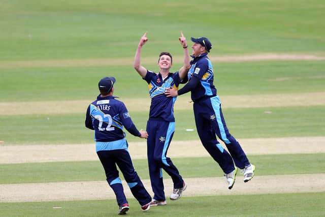 EARLY PROMISE: Matthew Fisher celebrates his first professional wicket with Joe Sayers and captain Andrew Gale on his debut at Scarborough in June 2013. PICTURE BY VAUGHN RIDLEY/SWPIX.COM