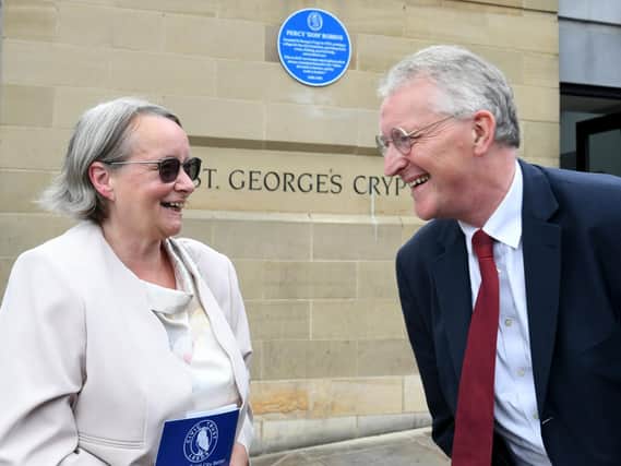 Delia Robins chats with Hilary Benn MP after she unveiled a blue plaque to her  father in law  Percy 'Don' Robins at St George's Crypt. PIC: Gary Longbottom